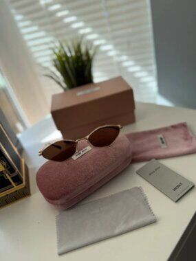 Miu Miu womens sunglasses cat eye